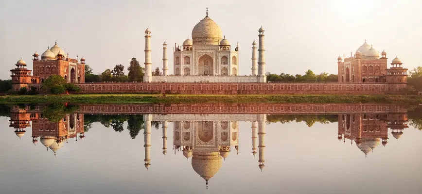 a sunset view of Taj Mahal